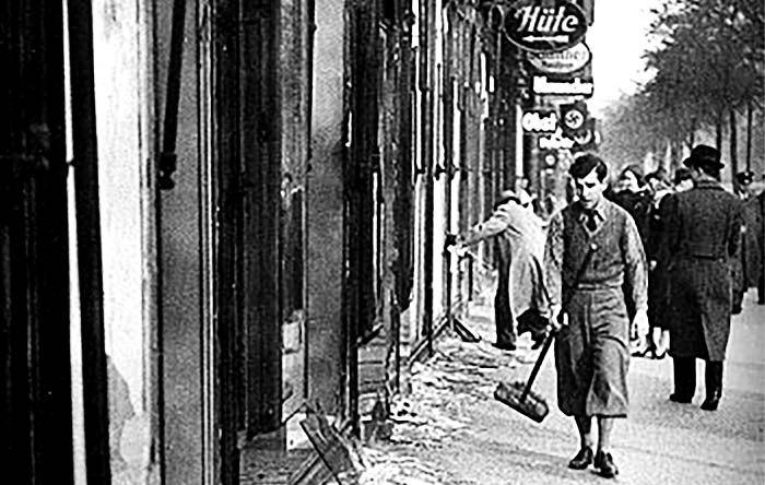 Cleaning the street after Kristallnacht